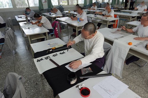 each contestant was fully focused on writing calligraphy